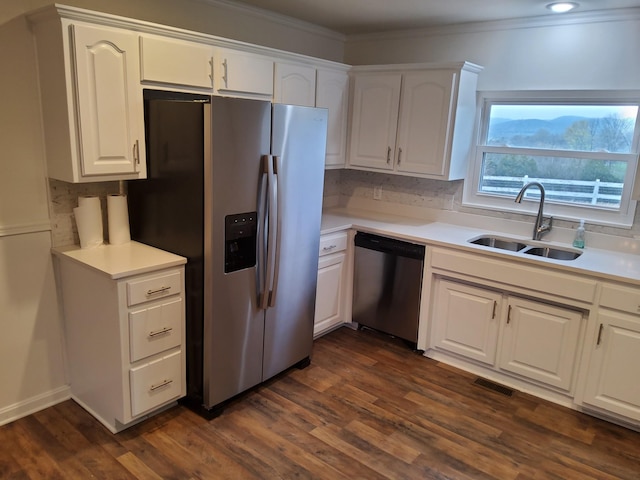 1833 Porterfield Rd, Readyville, TN 37149 - kitchen featuring visible vents, a sink, white cabinetry, stainless steel appliances, and backsplash