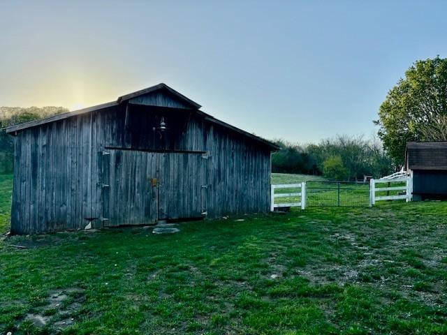 1833 Porterfield Rd, Readyville, TN 37149 - view of pole building featuring a yard and fence