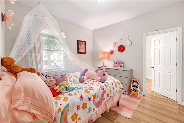 bedroom featuring light wood-type flooring
