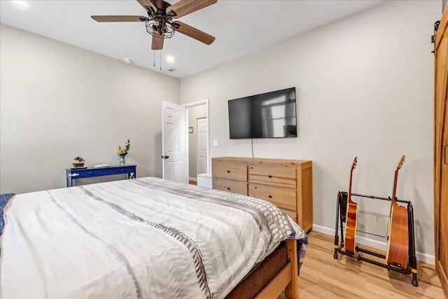 bedroom featuring recessed lighting, light wood-style floors, baseboards, and a ceiling fan