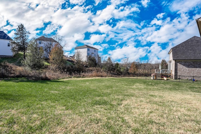 view of yard featuring fence