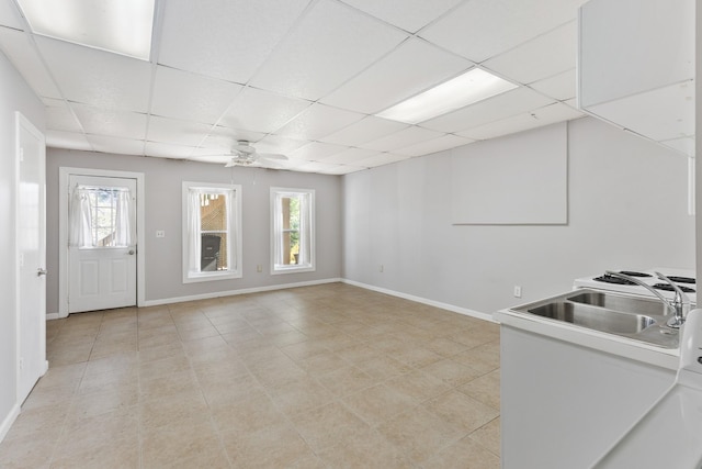 812 Deer Foot Ct, Nashville, TN 37221 - interior space with baseboards, a wealth of natural light, a drop ceiling, and ceiling fan
