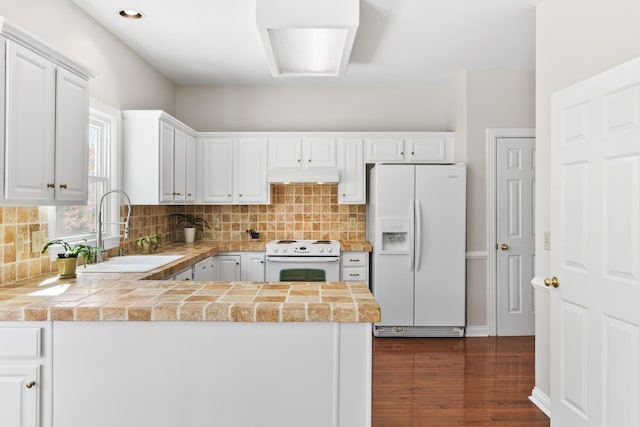 812 Deer Foot Ct, Nashville, TN 37221 - kitchen with tile counters, white appliances, under cabinet range hood, and a sink
