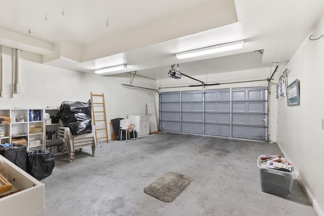 812 Deer Foot Ct, Nashville, TN 37221 - garage with a garage door opener and baseboards
