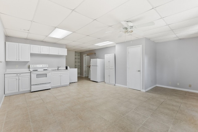 812 Deer Foot Ct, Nashville, TN 37221 - kitchen featuring light countertops, white appliances, a drop ceiling, a sink, and ceiling fan