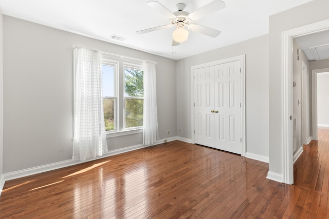 812 Deer Foot Ct, Nashville, TN 37221 - unfurnished bedroom with attic access, baseboards, visible vents, and hardwood / wood-style floors