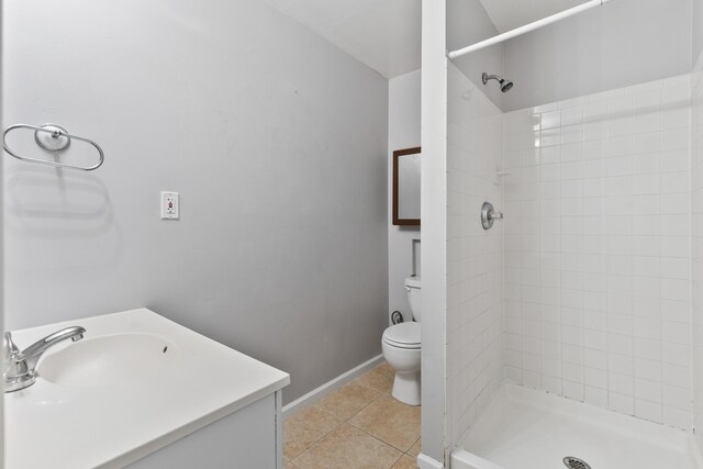 812 Deer Foot Ct, Nashville, TN 37221 - full bathroom featuring vanity, toilet, baseboards, tile patterned floors, and a stall shower