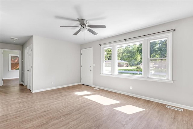1309 Ovoca Rd, Tullahoma, TN 37388 - unfurnished room featuring baseboards, light wood-type flooring, and a ceiling fan