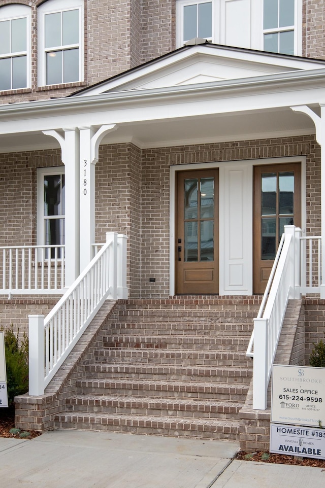 3180 Long Branch Cir, Franklin, TN 37064 - view of exterior entry with covered porch and brick siding