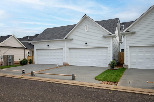 3180 Long Branch Cir, Franklin, TN 37064 - view of front facade with an attached garage, concrete driveway, and roof with shingles