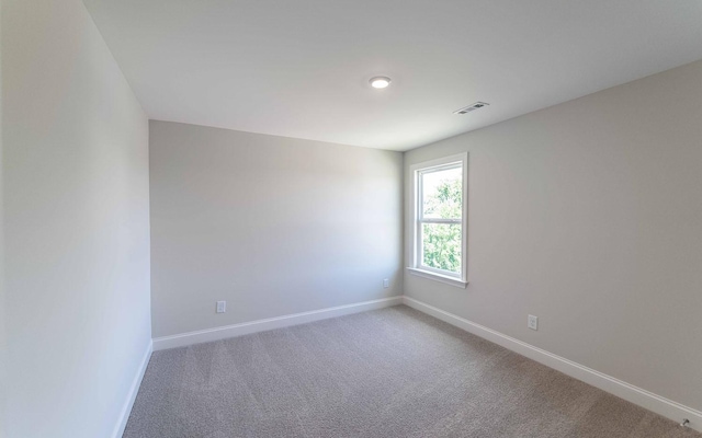 156 John T Alexander Blvd, Hendersonville, TN 37075 - carpeted spare room with baseboards