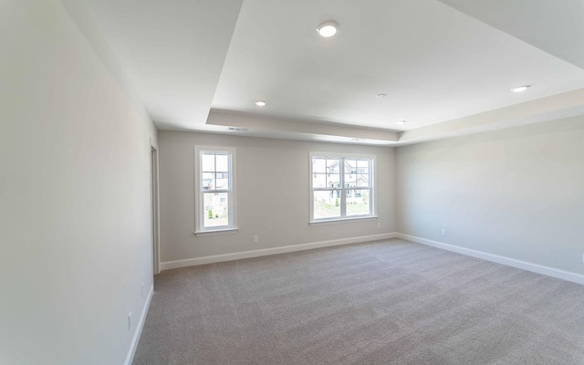 156 John T Alexander Blvd, Hendersonville, TN 37075 - unfurnished room featuring a tray ceiling, baseboards, recessed lighting, and carpet floors