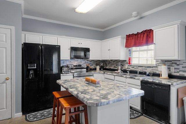 4009 Wellington Ct, Old Hickory, TN 37138 - kitchen with black appliances, a kitchen breakfast bar, white cabinetry, decorative backsplash, and ornamental molding
