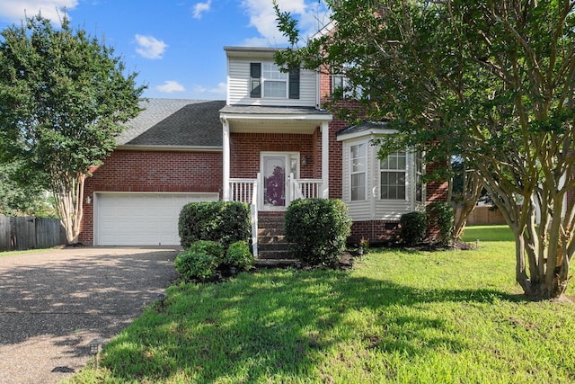 4009 Wellington Ct, Old Hickory, TN 37138 - traditional-style home with a garage, driveway, brick siding, and a shingled roof