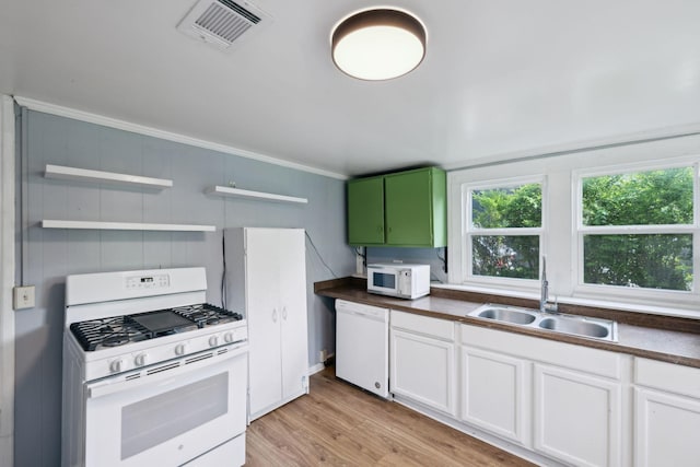 kitchen featuring visible vents, open shelves, plenty of natural light, a sink, and white appliances