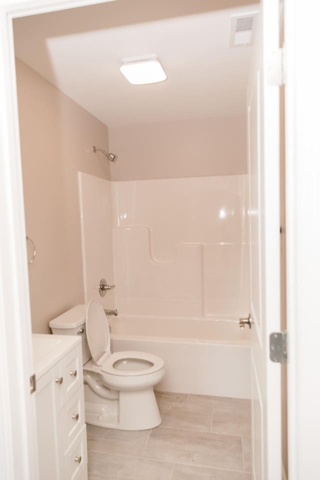 1361 Riley Hill Rd, Pulaski, TN 38478 - full bathroom featuring visible vents, toilet, vanity, and washtub / shower combination