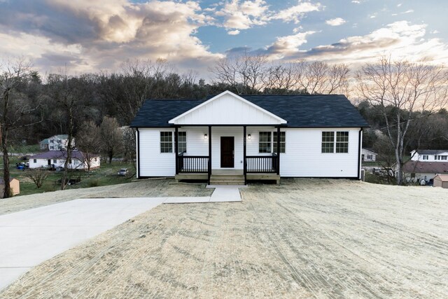 1361 Riley Hill Rd, Pulaski, TN 38478 - view of front of house featuring a porch and roof with shingles
