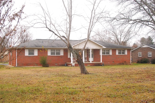 ranch-style house with a porch, brick siding, crawl space, and a front lawn