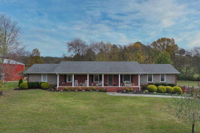 1935 Liberty Ln, Gallatin, TN 37066 - ranch-style home featuring a front yard, a porch, and stone siding