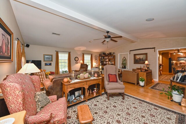 1935 Liberty Ln, Gallatin, TN 37066 - living area featuring visible vents, vaulted ceiling with beams, wood finished floors, and a ceiling fan