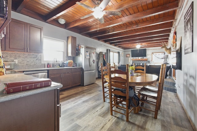 12 Dukes Ln, Kelso, TN 37348 - dining room featuring light wood-style flooring, wood ceiling, and a wealth of natural light