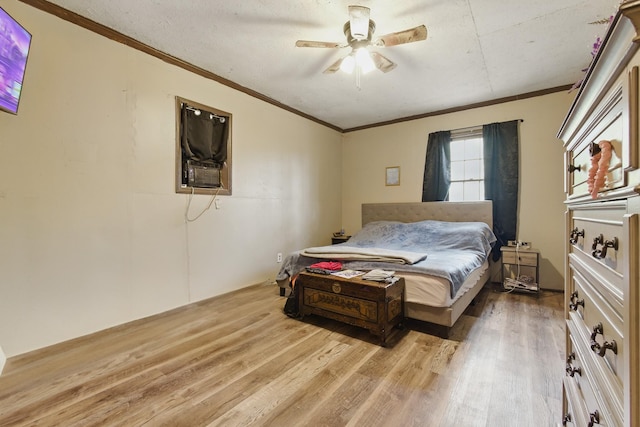 12 Dukes Ln, Kelso, TN 37348 - bedroom with ornamental molding, a ceiling fan, and wood finished floors