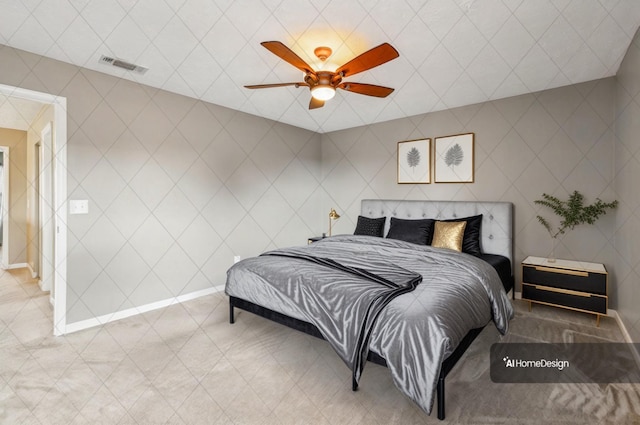 bedroom with ceiling fan, visible vents, and baseboards