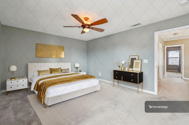 bedroom with a ceiling fan, baseboards, and visible vents