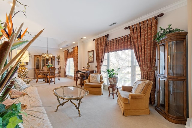 carpeted living room featuring crown molding, visible vents, recessed lighting, and a notable chandelier