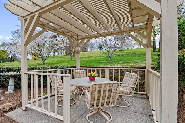 view of patio / terrace with a pergola and outdoor dining area