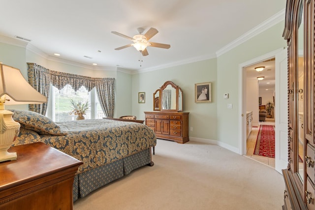 bedroom featuring crown molding, ceiling fan, visible vents, light carpet, and baseboards