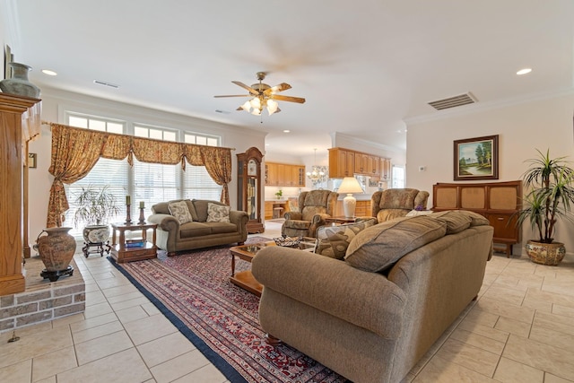 living area featuring ceiling fan, light tile patterned floors, ornamental molding, visible vents, and recessed lighting