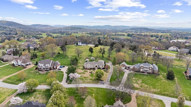 birds eye view of property featuring a residential view and a mountain view
