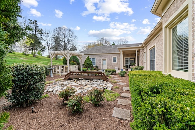 view of yard with a pergola