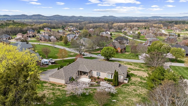 aerial view featuring a residential view and a mountain view