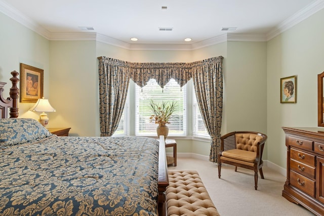 bedroom featuring visible vents, light colored carpet, baseboards, and ornamental molding