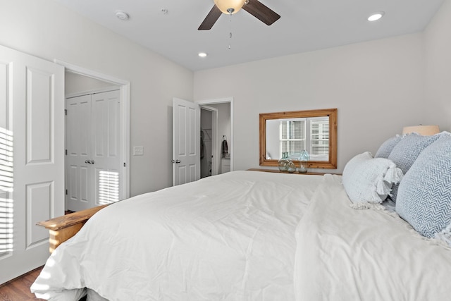 bedroom with a closet, recessed lighting, wood finished floors, and a ceiling fan