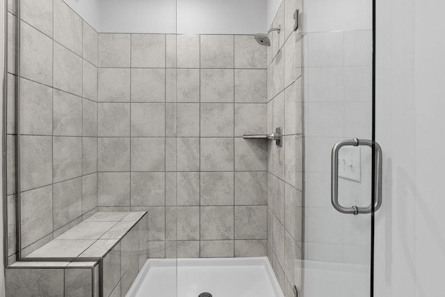 bathroom featuring a shower stall