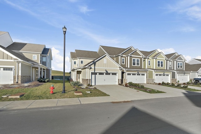 craftsman inspired home with board and batten siding, driveway, a front yard, and a residential view