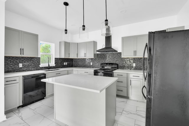kitchen with a sink, wall chimney range hood, black appliances, gray cabinetry, and marble finish floor