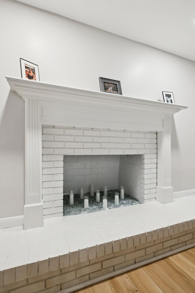 1048 Edgewater Cir, Gallatin, TN 37066 - room details featuring a brick fireplace and baseboards