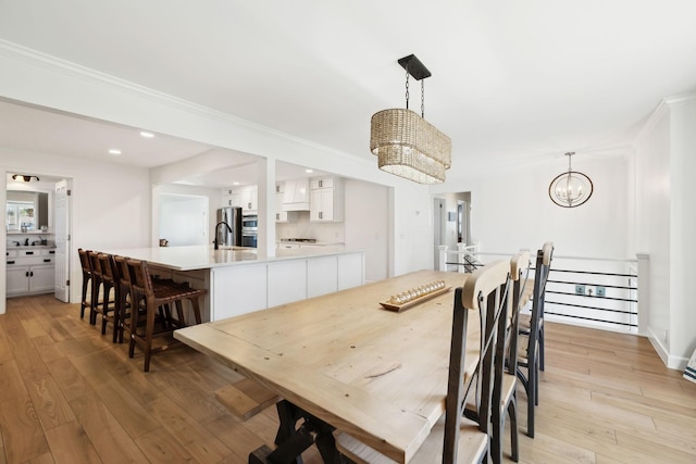 1048 Edgewater Cir, Gallatin, TN 37066 - dining room featuring recessed lighting, a notable chandelier, and light wood-style flooring