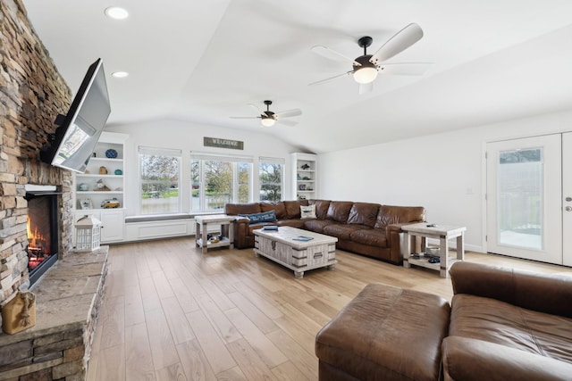 1048 Edgewater Cir, Gallatin, TN 37066 - living area with a ceiling fan, a fireplace, light wood finished floors, and vaulted ceiling
