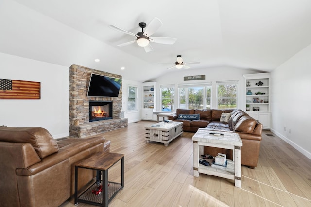 1048 Edgewater Cir, Gallatin, TN 37066 - living room with ceiling fan, light wood finished floors, a fireplace, baseboards, and lofted ceiling