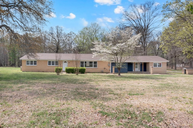 view of front of home with a front yard