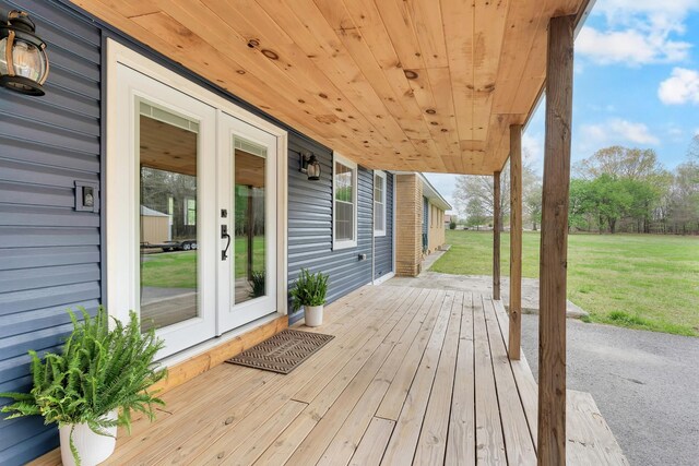 deck featuring a yard