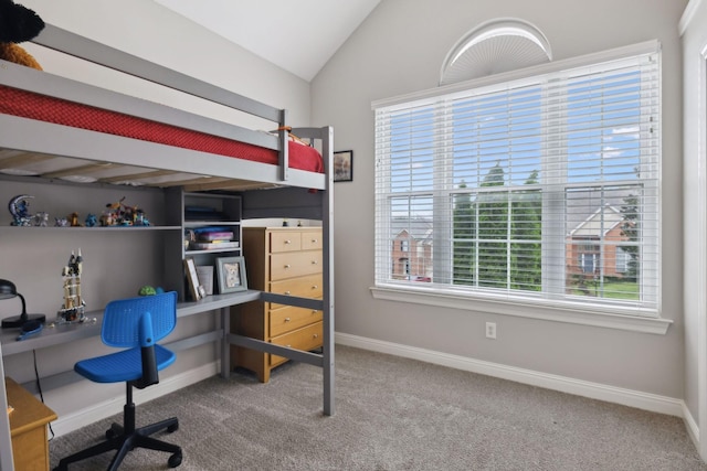 bedroom with baseboards, carpet flooring, and lofted ceiling