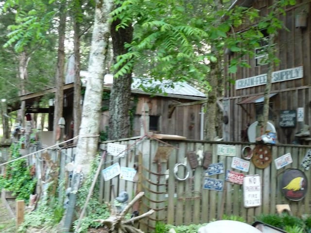 exterior space with metal roof