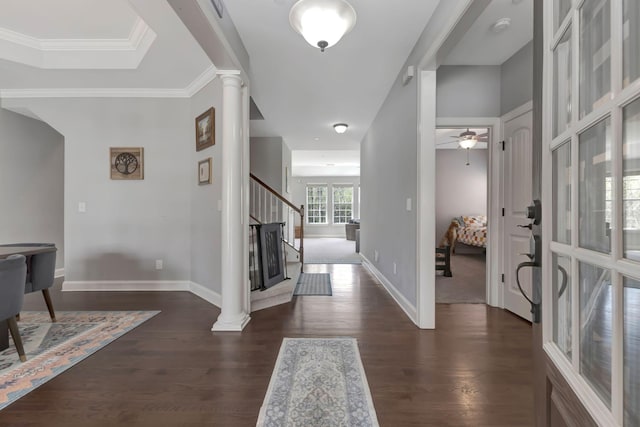 6029 Christmas Dr, Nolensville, TN 37135 - entryway with dark wood-style flooring, baseboards, ornamental molding, ceiling fan, and decorative columns