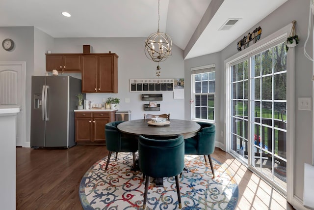 6029 Christmas Dr, Nolensville, TN 37135 - dining area featuring an inviting chandelier, visible vents, recessed lighting, wood finished floors, and lofted ceiling